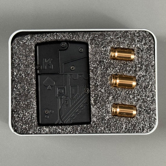 Disguised as a sleek black playing card, this pocket-sized blaster delivers a hidden dart punch with gold cartridge shells. A stealthy must-have for collectors and pranksters.